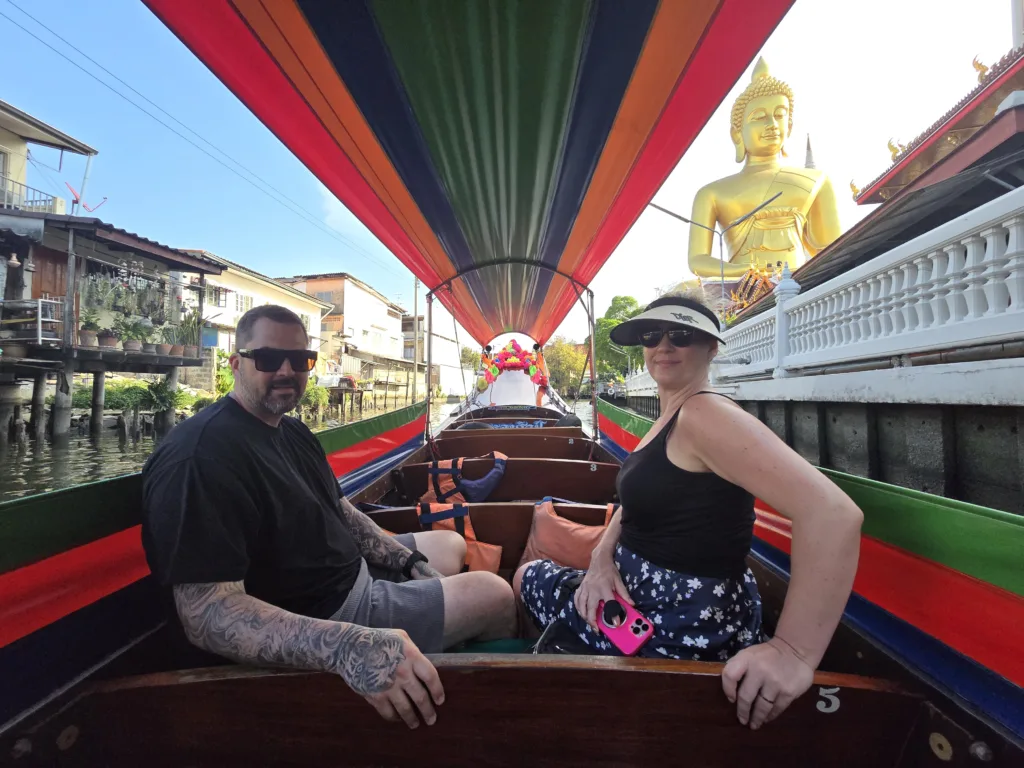 longtail boat along with the peaceful canals