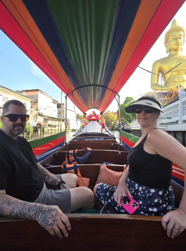 longtail boat along with the peaceful canals